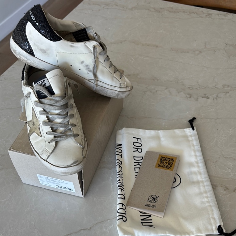 Golden Goose White Sneakers with Black and Gold Accents
